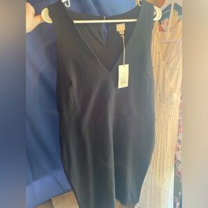 Body con dress with pockets.